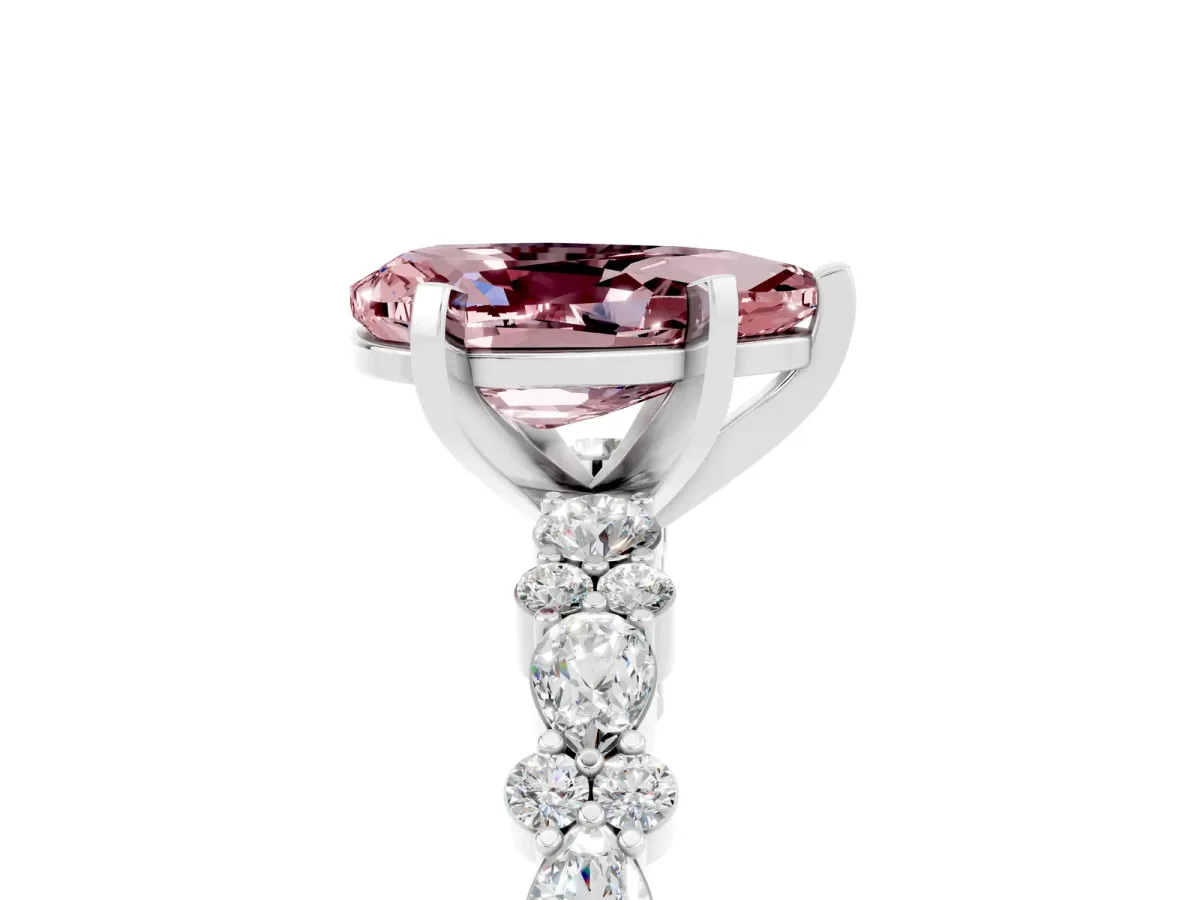 Pear Cut Morganite Side Stone Solitaire Ring with Round and Four-Prong Setting White gold