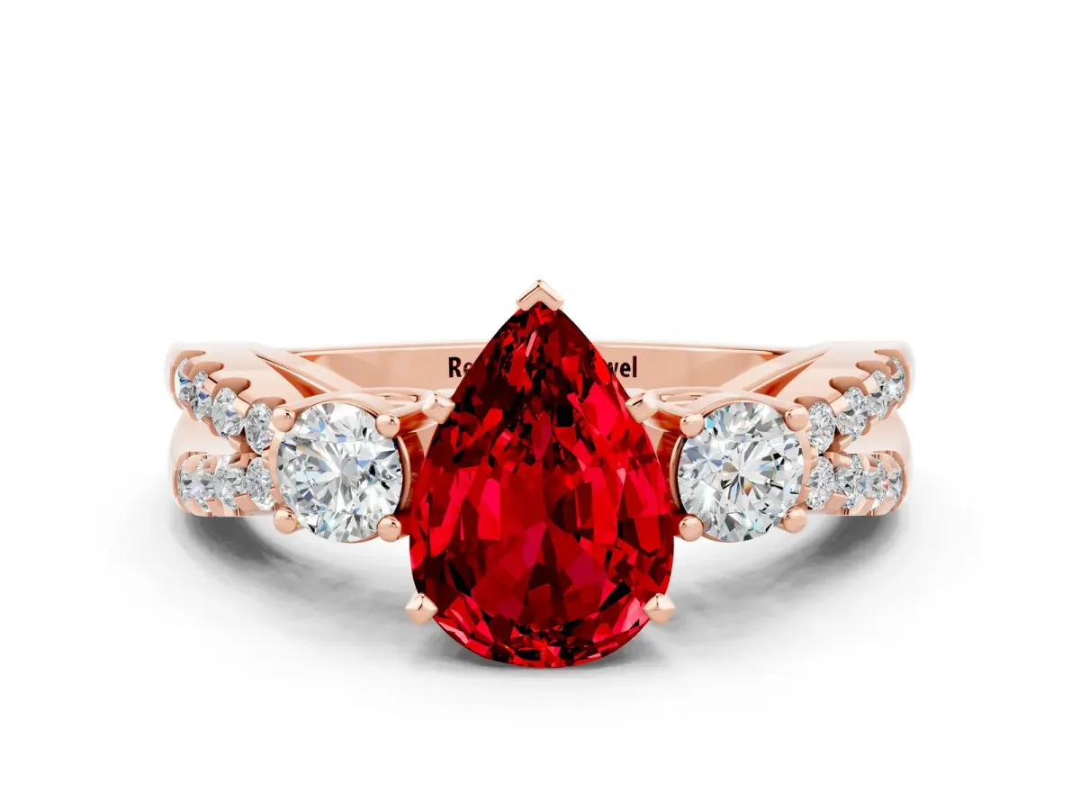 Pear Cut Ruby Three-Stone Ring with Pavé Split Shank and Four-Prong Setting Rose gold