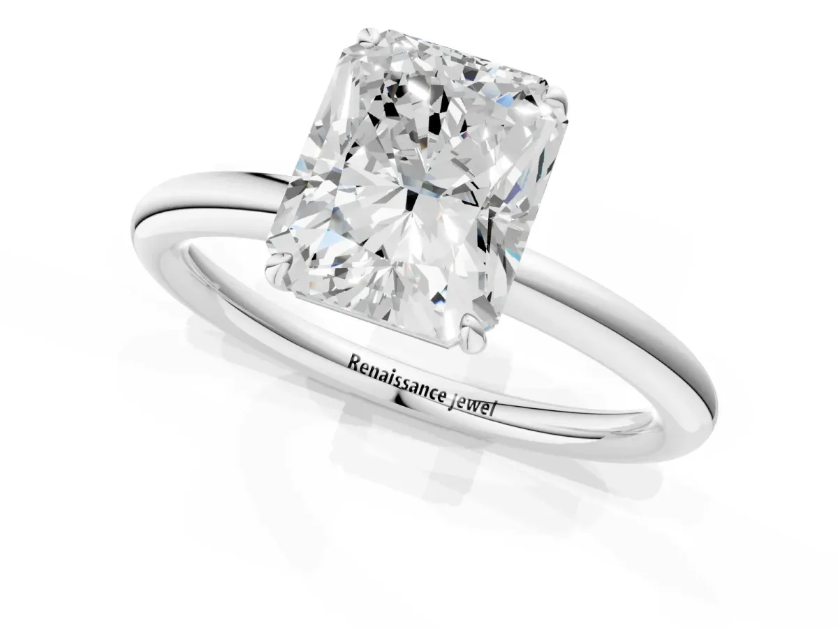 Radiant Cut Solitaire Diamond Ring with Four-Prong Setting on a Plain Band Platinum