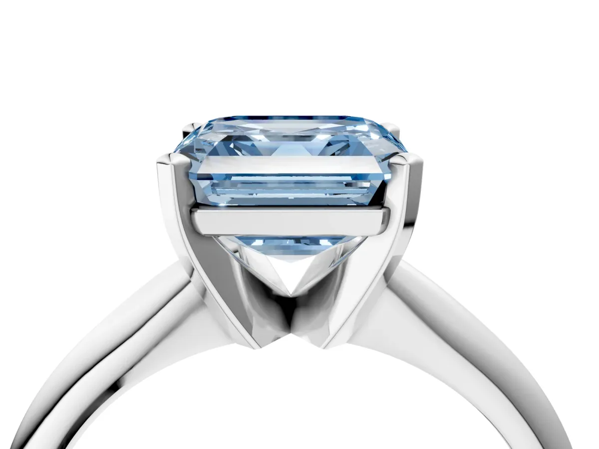Fancy Blue Asscher Cut Cut Solitaire Ring with Four-Prong Setting on a Classic Band Platinum