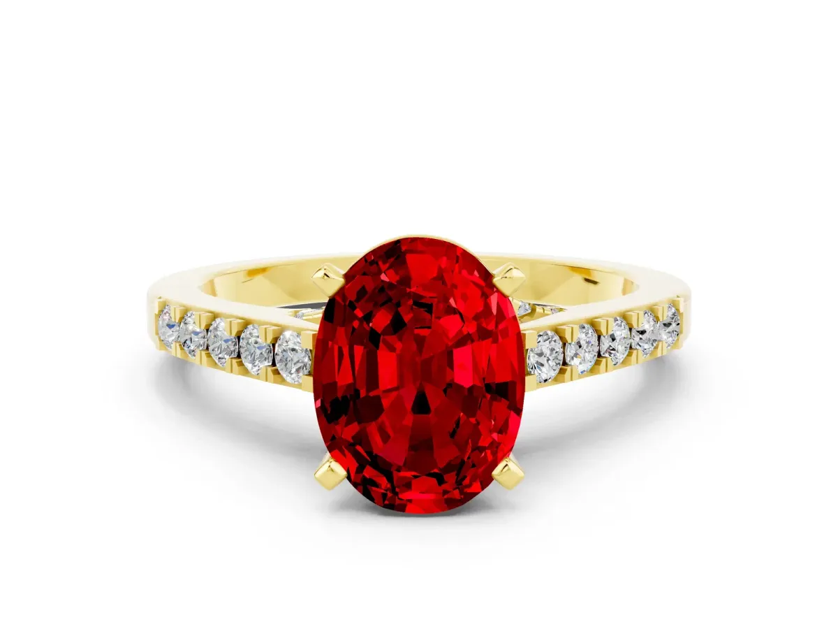 Oval Cut Ruby Solitaire Ring with Crossover Gallery and Round Pavé Band Yellow gold