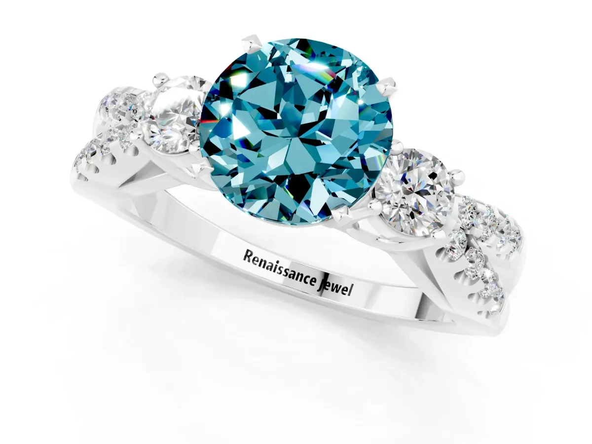 Round Cut Blue Topaz Three-Stone Ring with Pavé Split Shank and Four-Prong Setting Silver