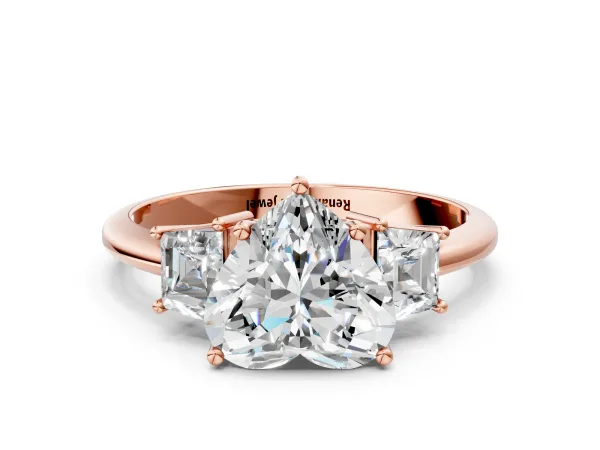 Heart Cut Diamond Three-Stone Ring with Trapezoid Side Stones and Prong Setting Rose gold