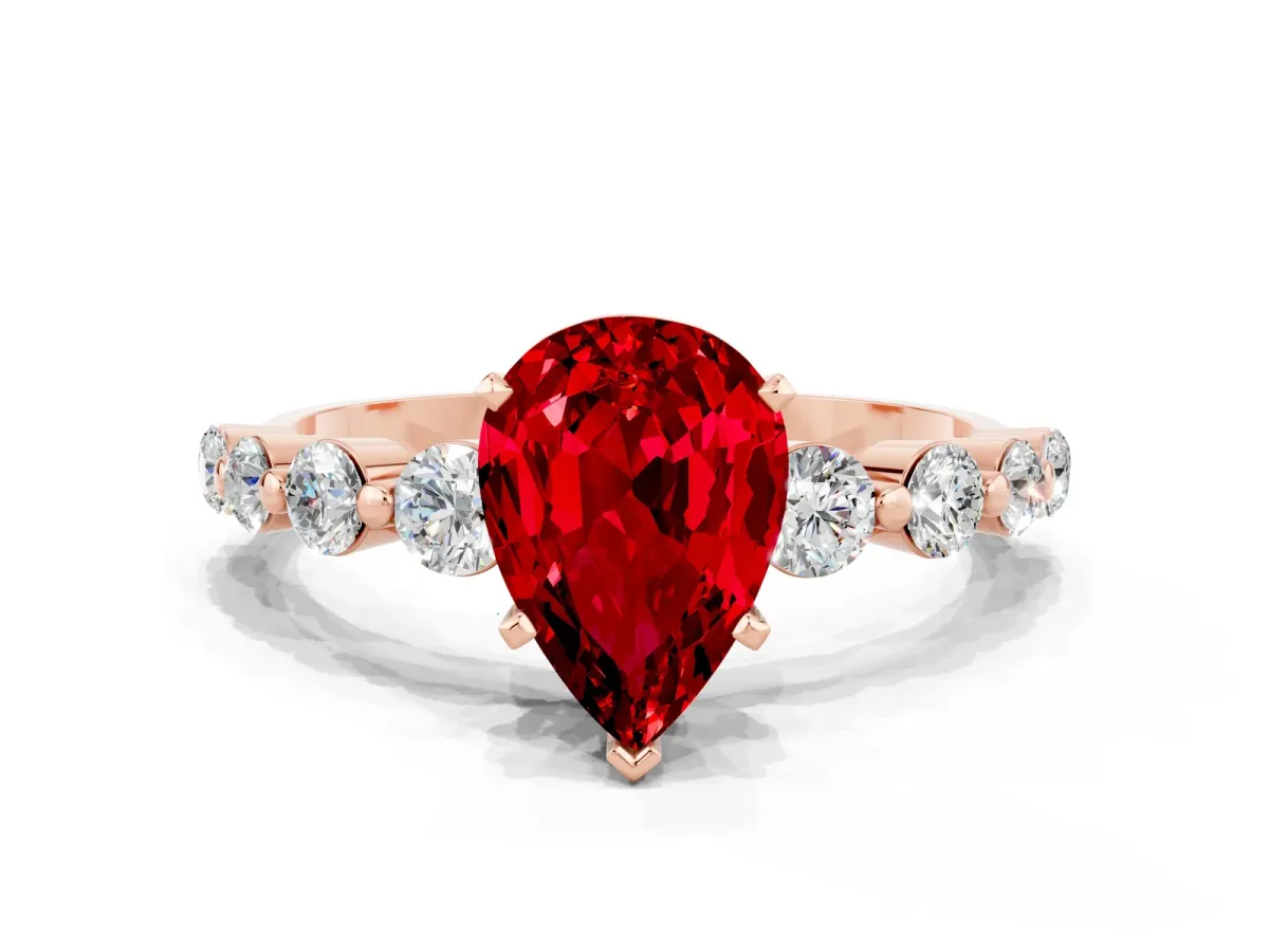 Pear Cut Solitaire Ruby Ring with Pave Band and Four-Prong Setting Rose gold