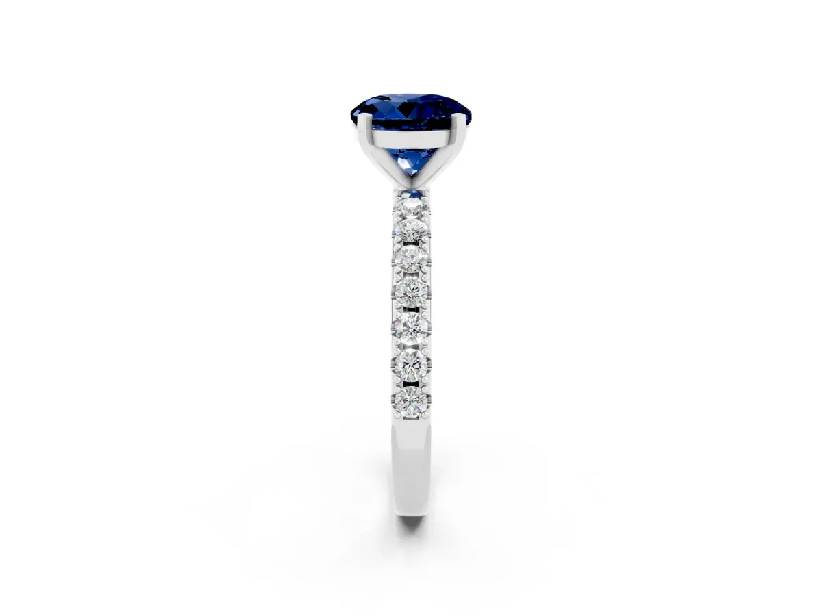 Round Cut Blue Sapphire Solitaire Pavé Band with Four-Prong Setting Platinum