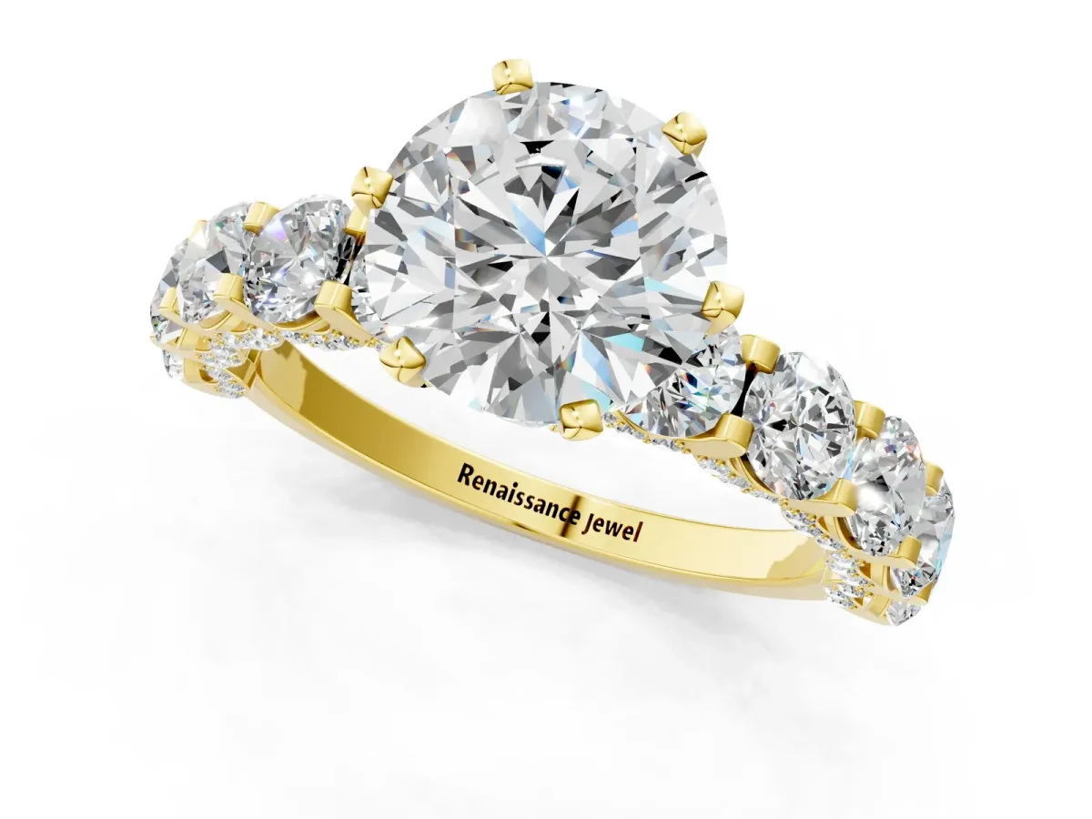 Round Cut Diamond Side Stone Engagement Ring with Four-Prong Setting Yellow gold