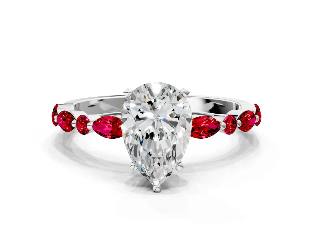 Pear Cut Diamond Ring with Marquise and Round Ruby Side Stones and Four-Prong Setting Platinum