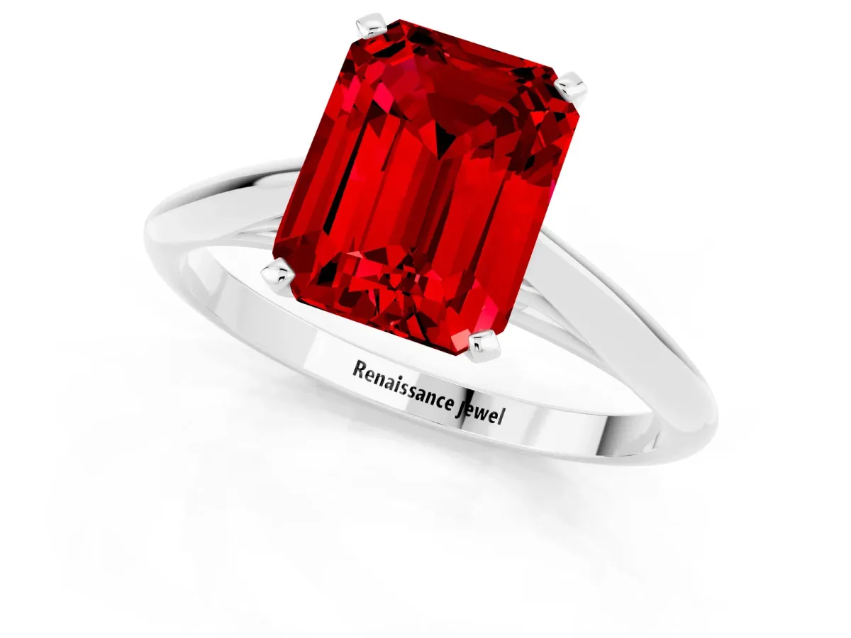 Emerald Cut Ruby Solitaire Engagement Ring with Cathedral Setting and Four-Prong Mount White gold