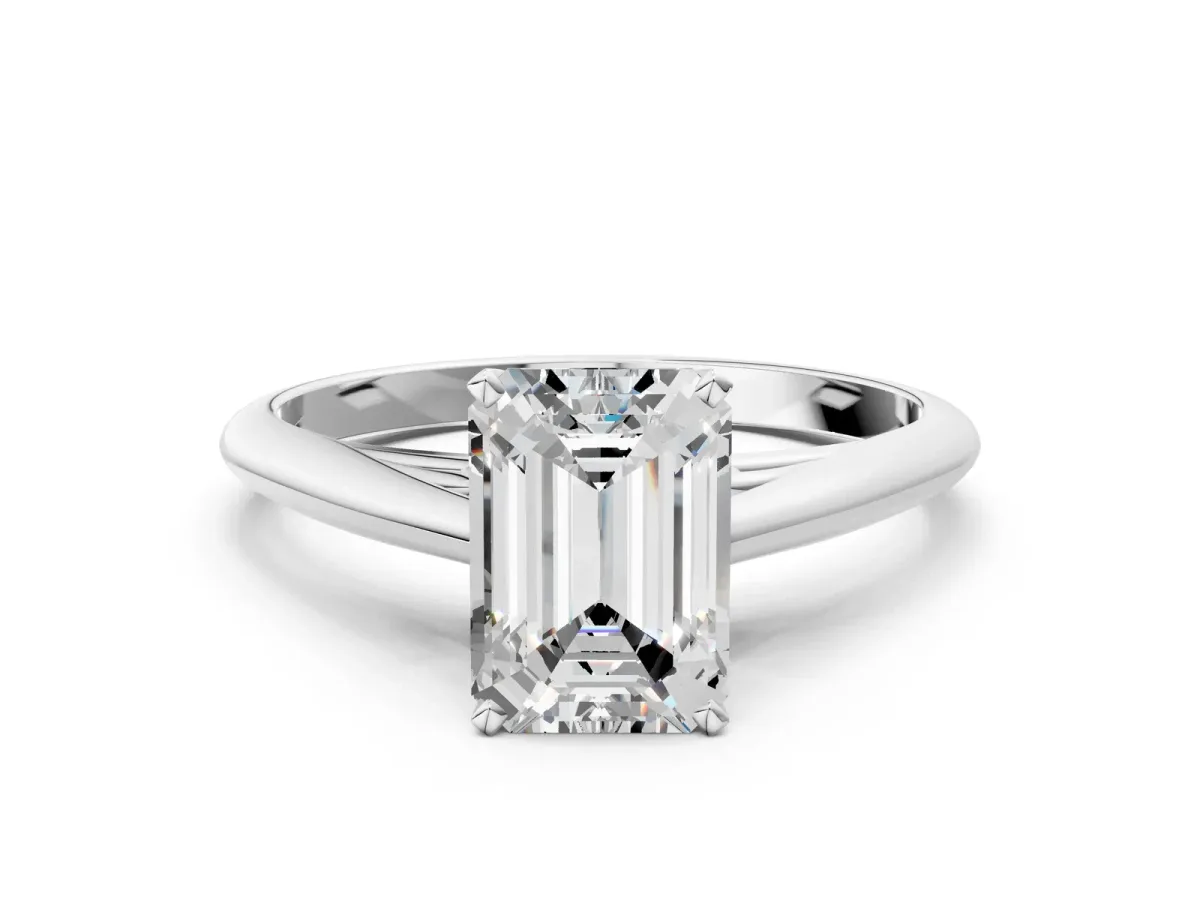 Emerald Cut Diamond Solitaire Engagement Ring with Cathedral Setting and Four-Prong Mount White gold