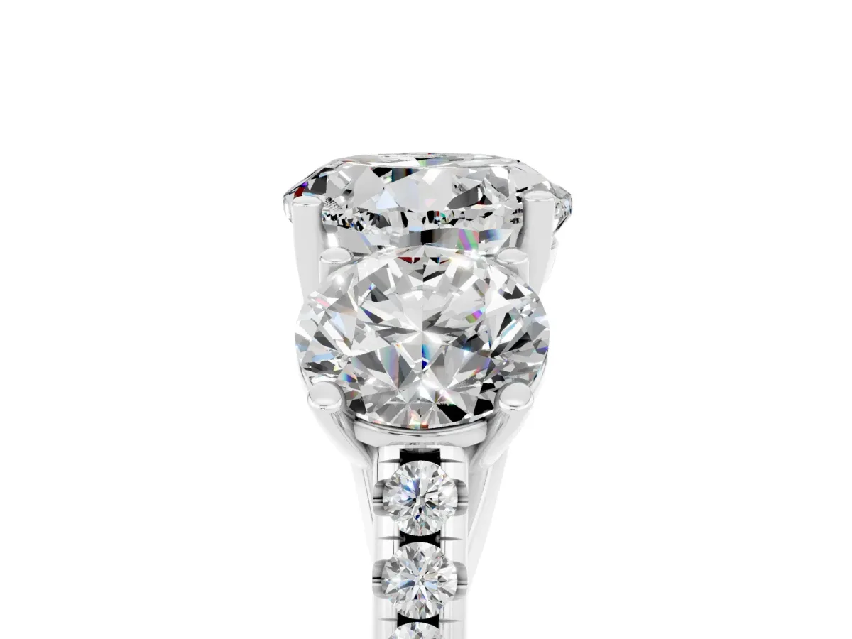 Three-Stone Round Cut Moissanite Ring with Round Pavé Band and Prong Setting Platinum