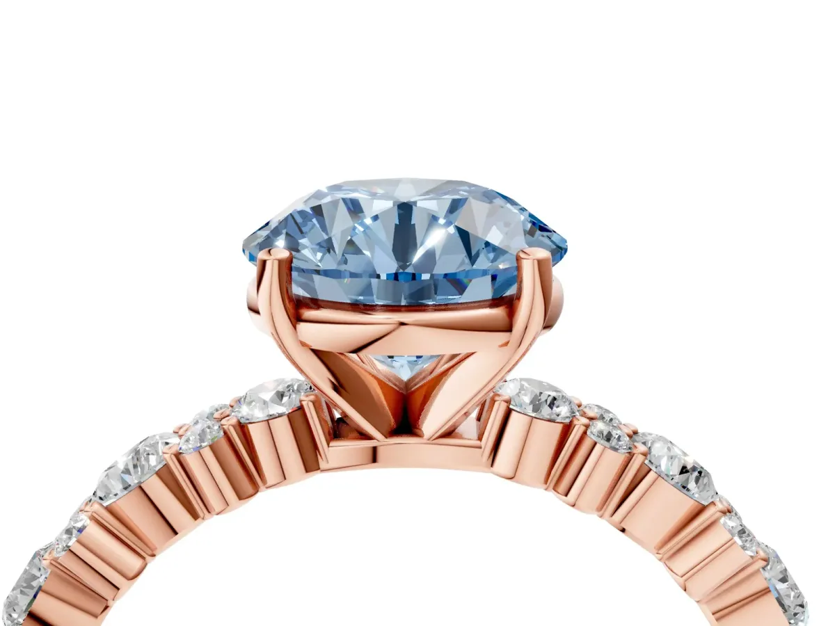 Fancy Blue Round Cut Diamond Side Stone Solitaire Ring with Round and Four-Prong Setting Rose gold