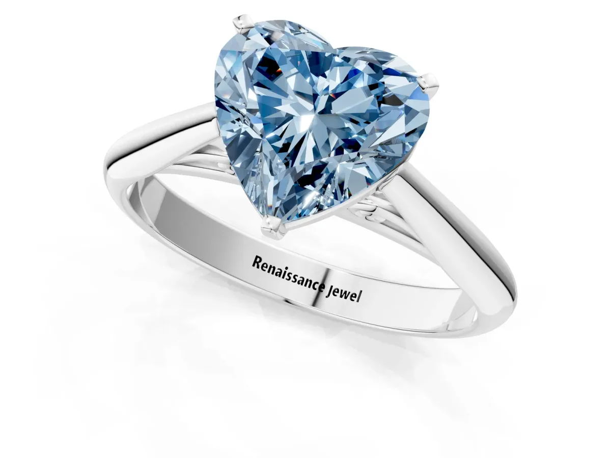 Fancy Blue Heart Cut Diamond Solitaire Engagement Ring with Cathedral Setting and Four-Prong Mount Silver