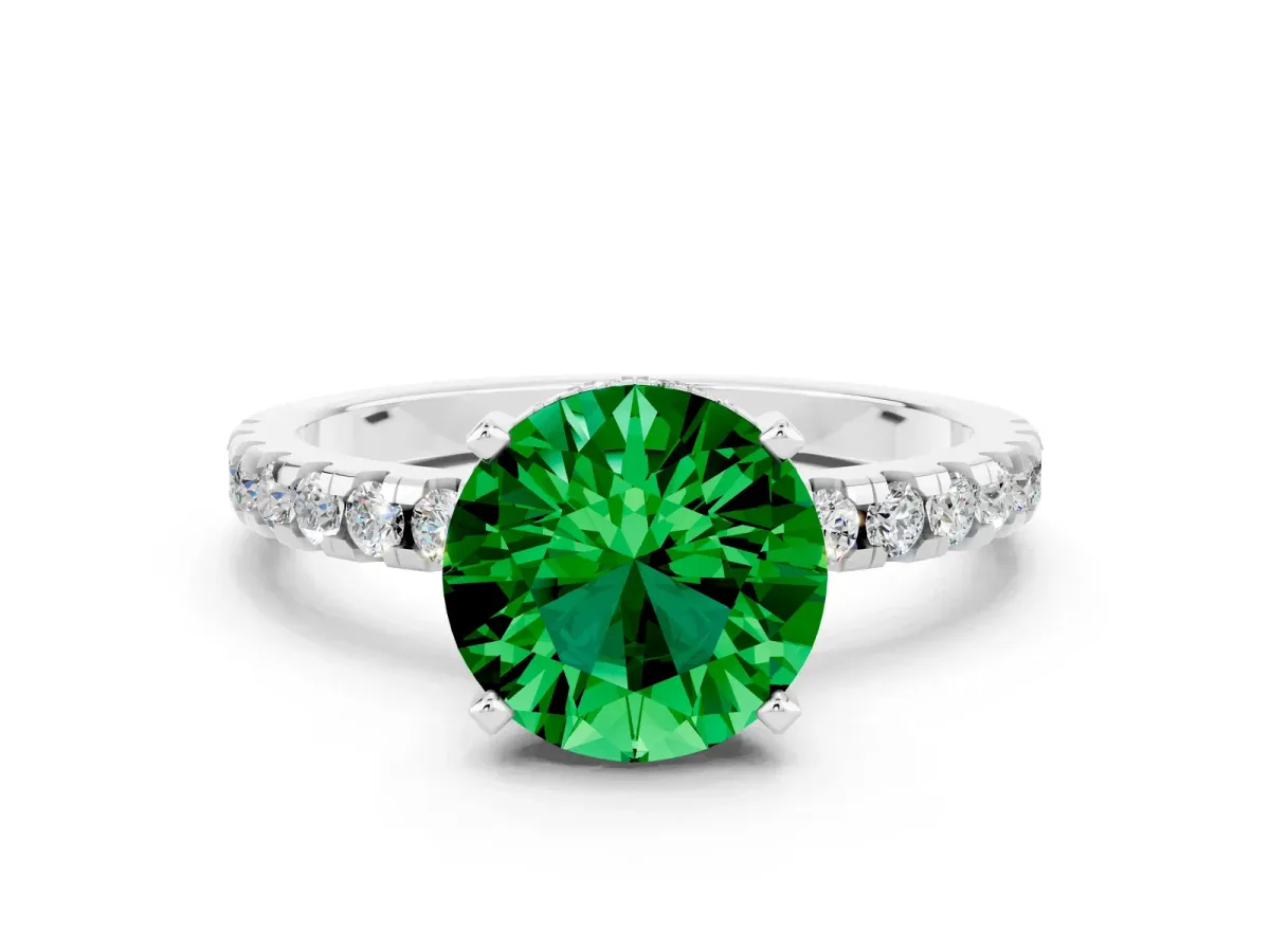 Round Cut Emerald Solitaire Ring with Round Pavé Band and Four-Prong Setting Silver