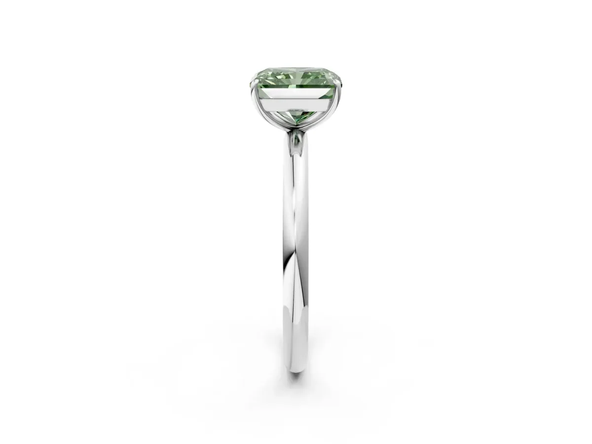 Fancy Green Radiant Cut Solitaire Diamond Ring with Four-Prong Setting on a Plain Band Platinum