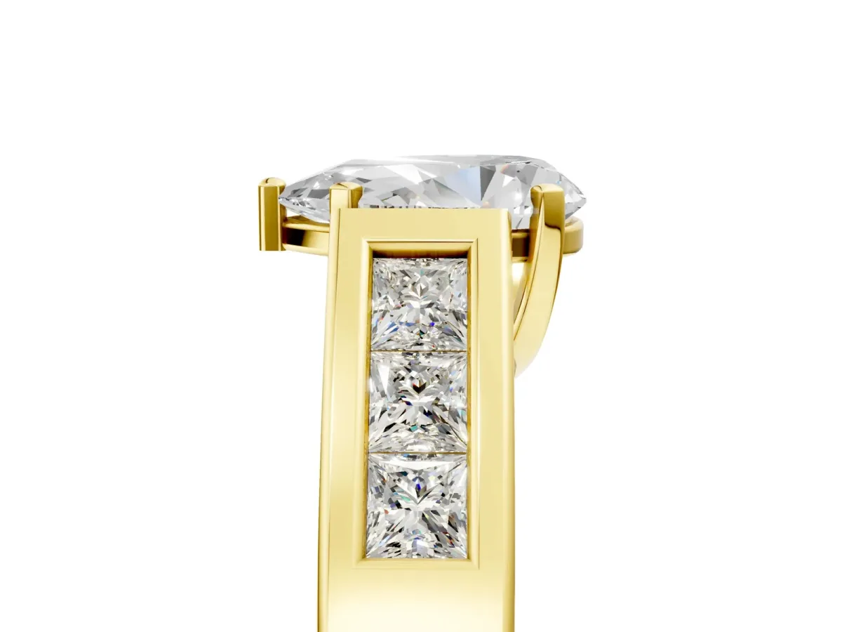Pear Cut Cut Channel Set Solitaire Ring with Four-Prong Setting Yellow gold
