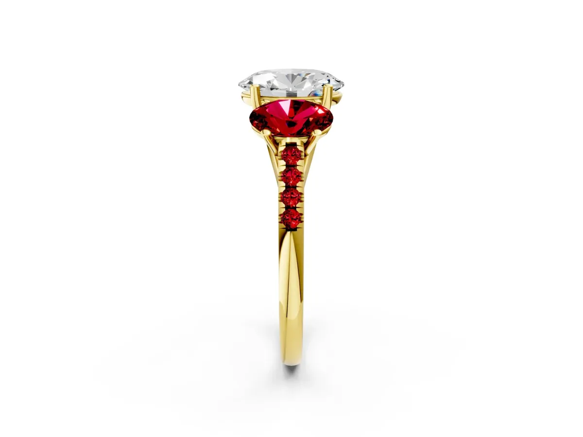 Three-Stone Oval Cut Diamond Ring with Round Ruby Pavé Band and Prong Setting Yellow gold
