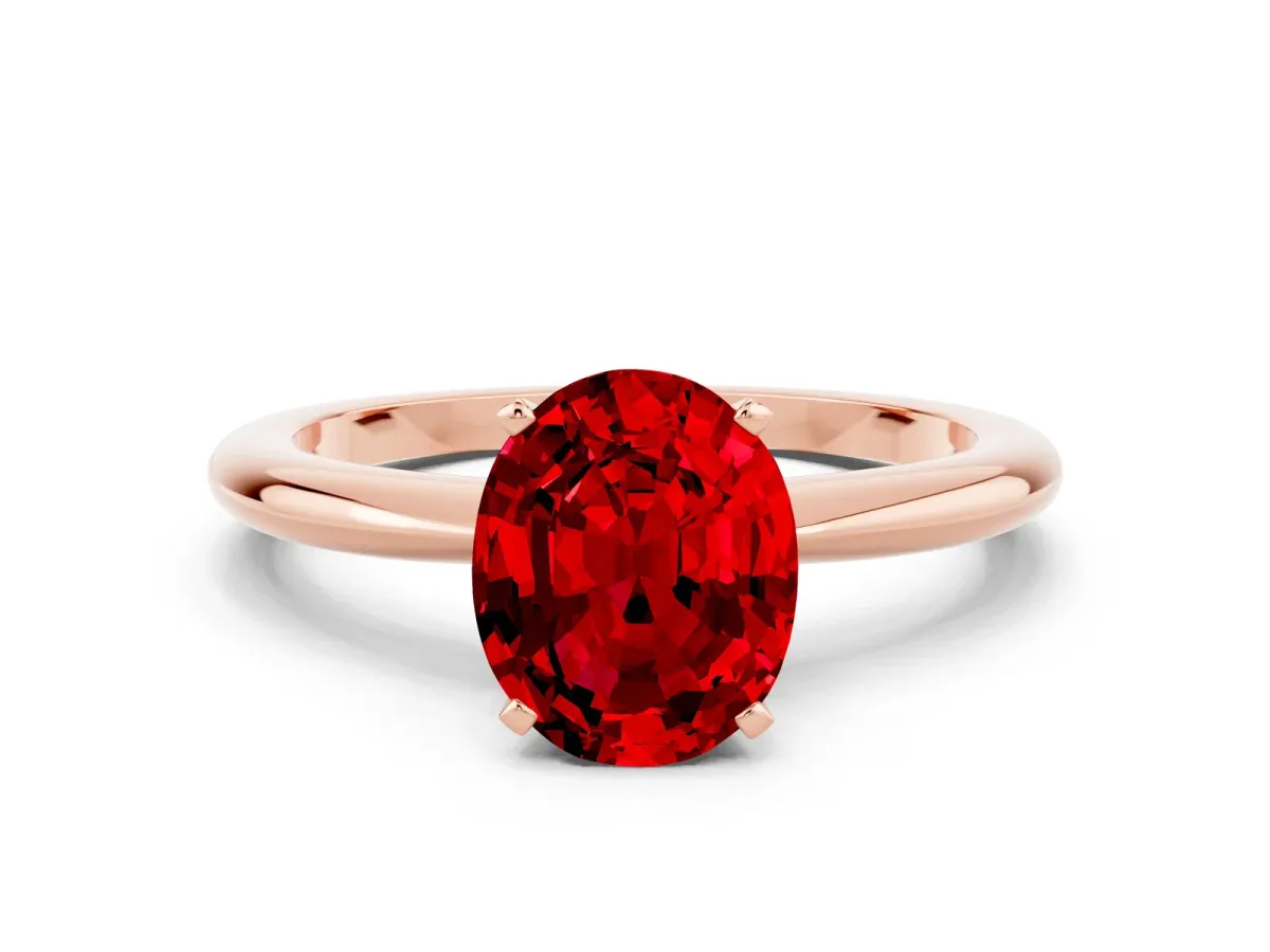 Oval Cut Ruby Solitaire Ring with Six-Prong Setting and Classic Band Rose gold