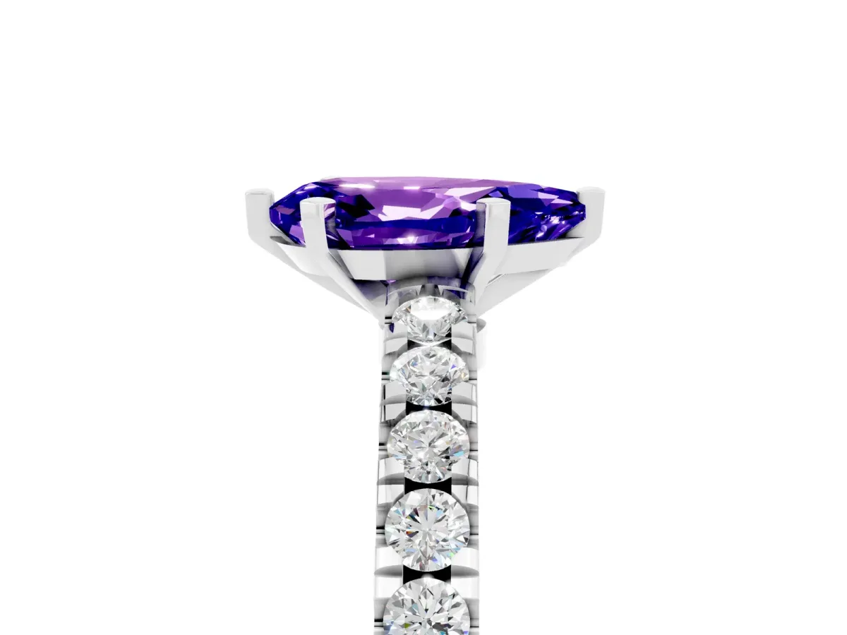 Pear Cut Solitaire Tanzanite with Pavé Band and Four-Prong Setting Silver