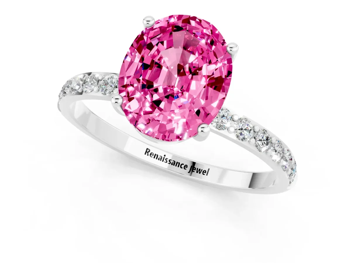 Oval Cut Pink Sapphire Solitaire Ring with Round Pavé Band and Prong Setting Silver