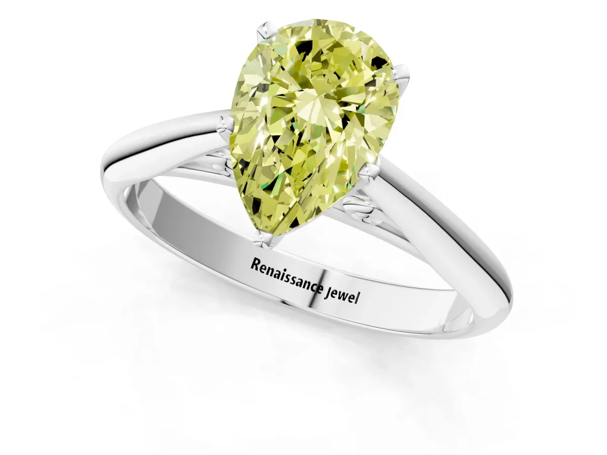 Fancy Yellow Pear Cut Diamond Solitaire Engagement Ring with Cathedral Setting and Four-Prong Mount Silver