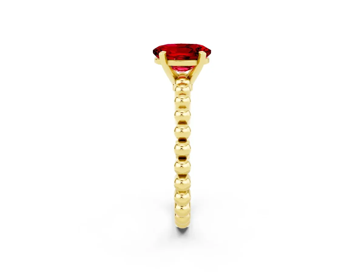 Oval Cut Ruby Solitaire Ring with Beaded Band and Prong Setting Yellow gold