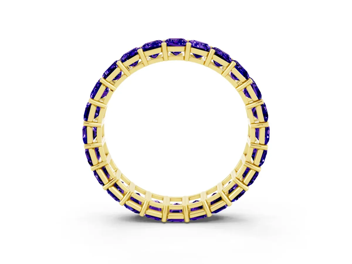 Emerald Cut Tanzanite Eternity Band with Shared Prong Setting Yellow gold