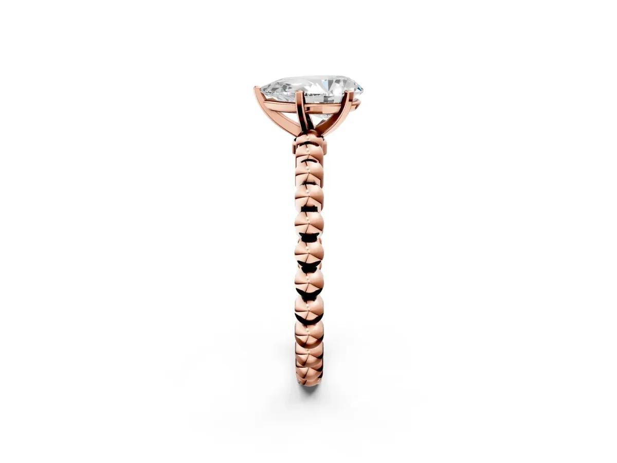 Pear Cut Diamond Solitaire Ring with Beaded Band and Prong Setting Rose gold