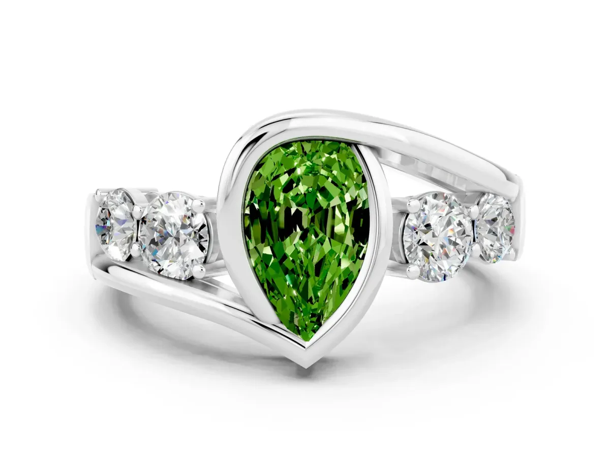 Bezel Set Pear Cut Peridot Bypass Ring with Round Accents Silver