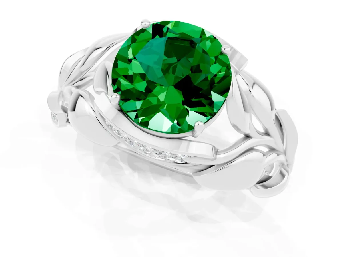 Round Cut Emerald Leaf-Inspired Engagement Ring with Round Accents and Prong Setting Silver