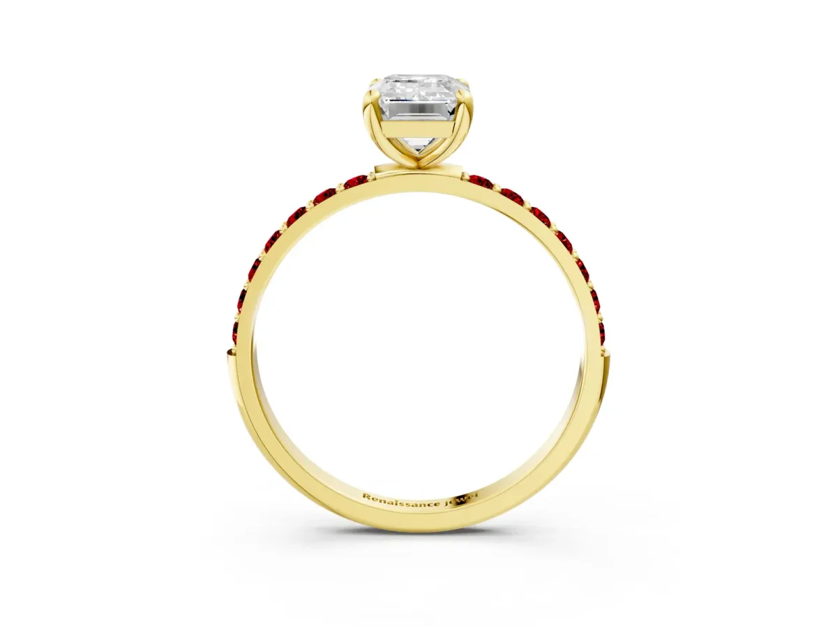 Emerald Cut Diamond Solitaire Ring with Round Ruby Pavé Band and Prong Setting Yellow gold