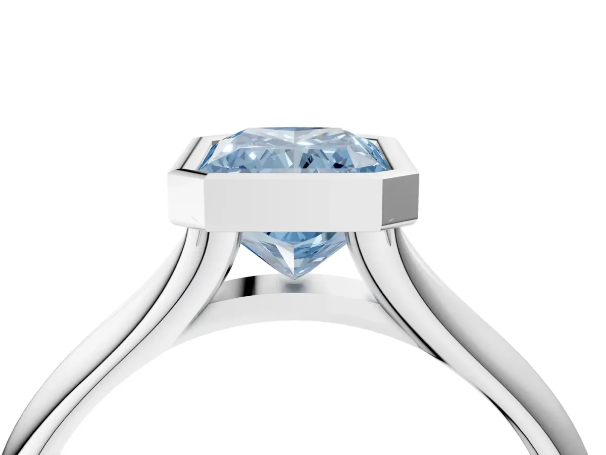 Fancy Blue Bezel Set Radiant Cut Solitaire Diamond Ring with Smooth Band Platinum