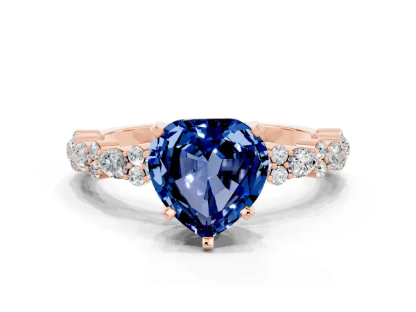 Heart Cut Blue Sapphire Side Stone Solitaire Ring with Round and Four-Prong Setting Rose gold