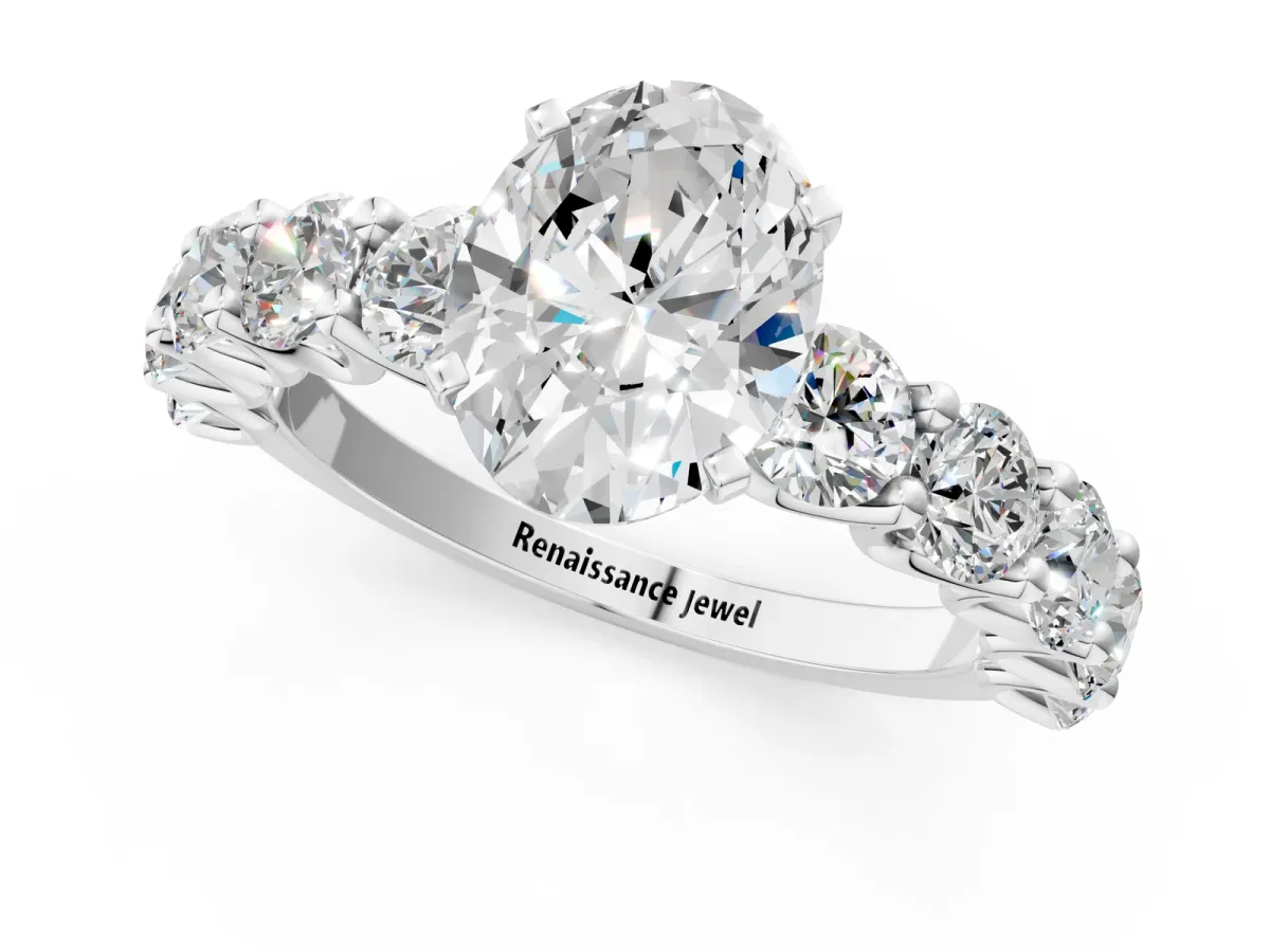 Oval Cut Diamond Prong Setting with Side Stones on a Pave Band White gold