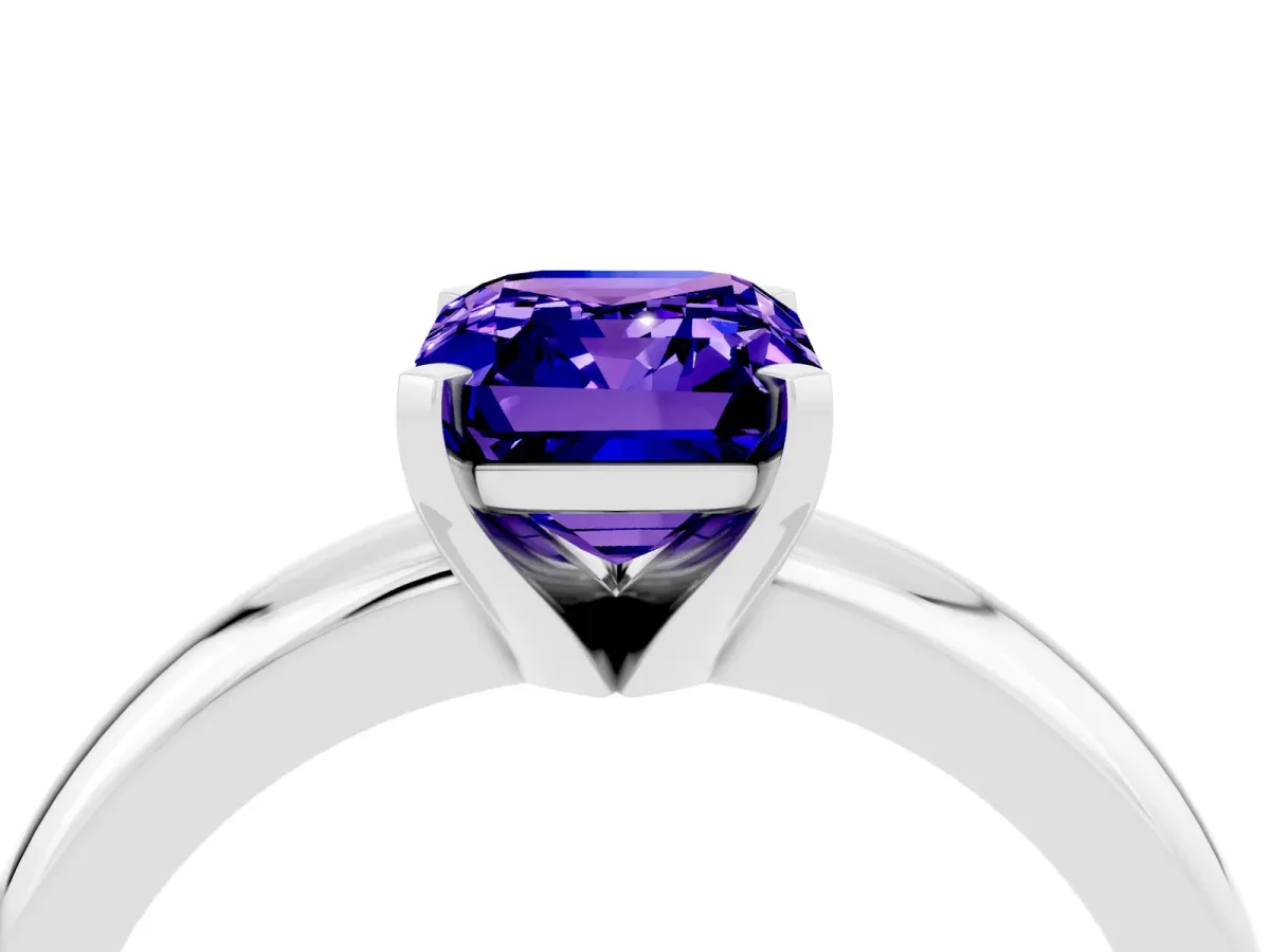 Emerald Cut Tanzanite Solitaire Engagement Ring with Round Band and Four-Prong Setting Silver