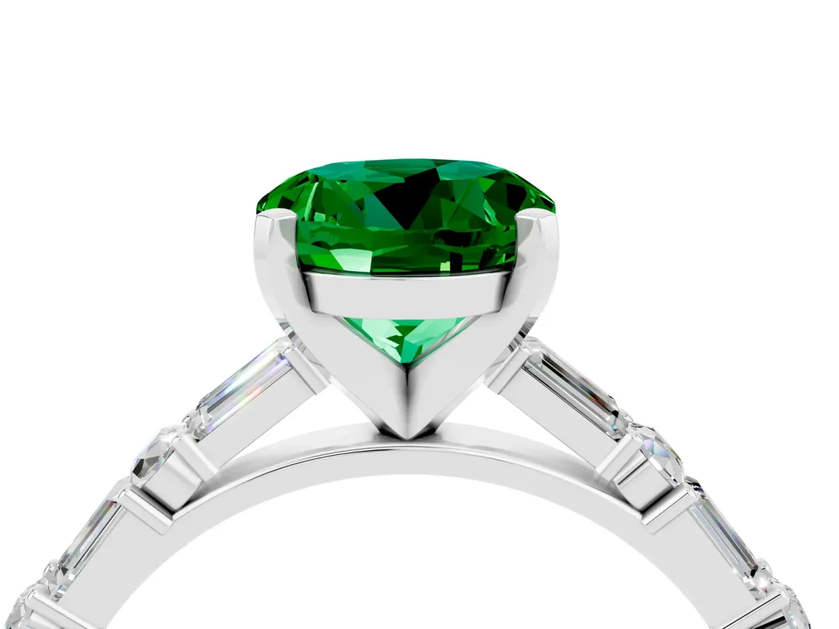 Round Cut Emerald Solitaire with Side Baguettes and Channel Set Band Platinum