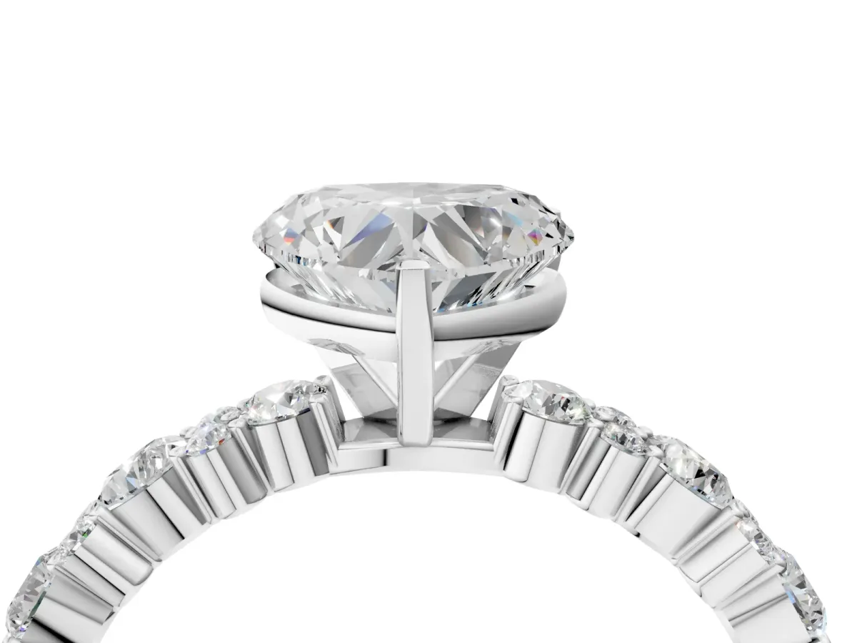 Heart Cut Diamond Side Stone Solitaire Ring with Round and Four-Prong Setting White gold
