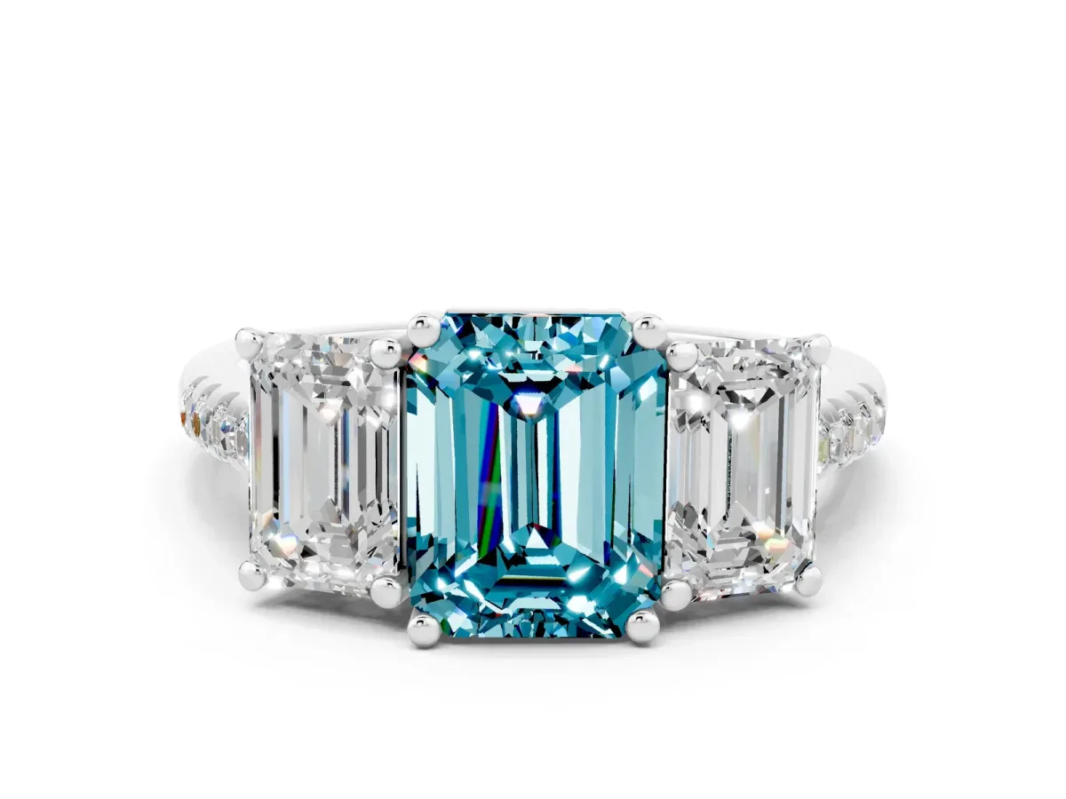 Three-Stone Emerald Cut Blue Topaz Ring with Round Pavé Band and Prong Setting Platinum
