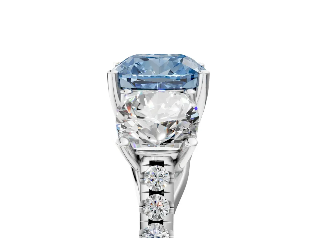 Fancy Blue Three-Stone Cushion Cut Diamond Ring with Round Pavé Band and Prong Setting Silver