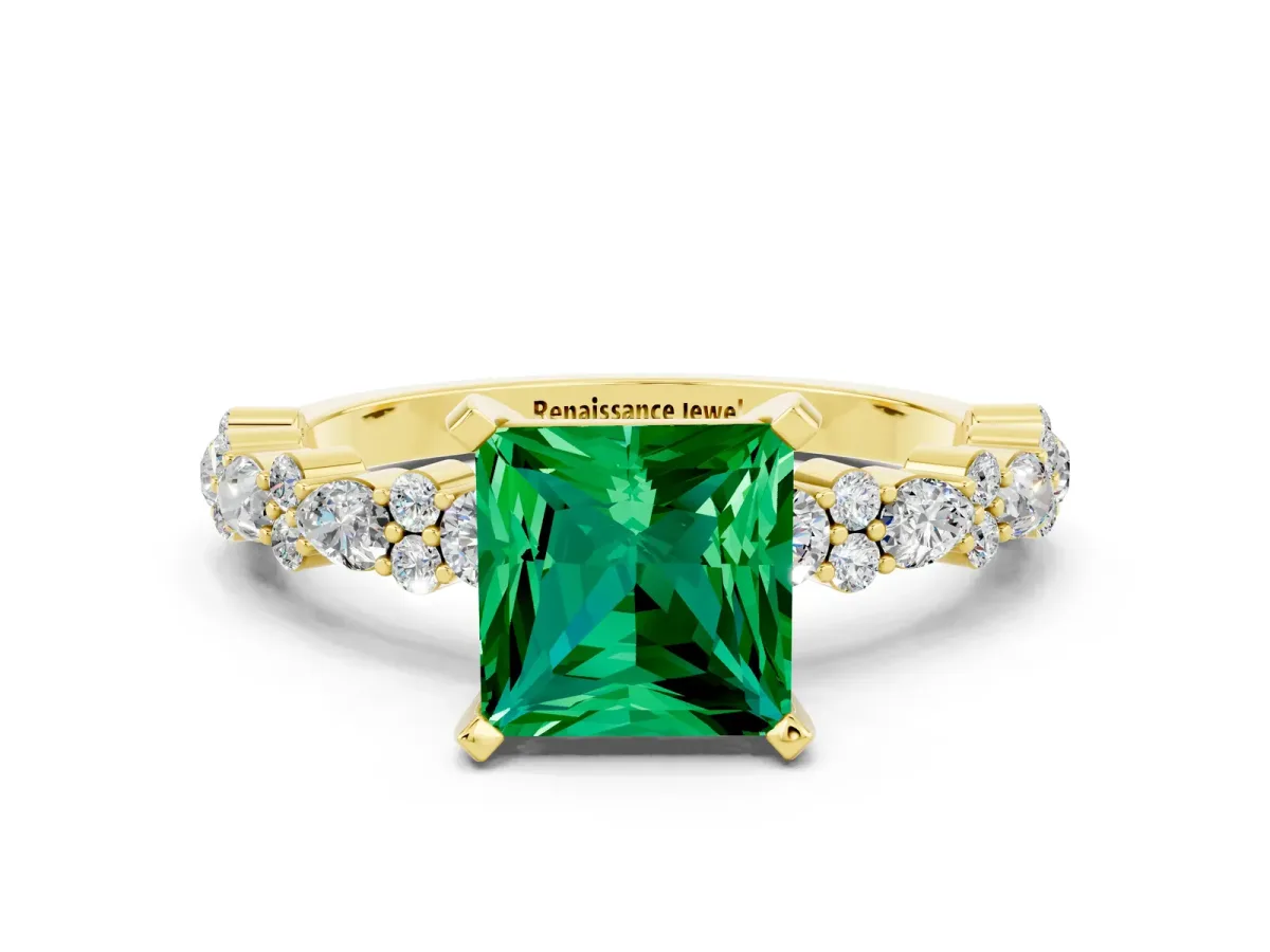 Princess Cut Emerald Side Stone Solitaire Ring with Round and Four-Prong Setting Yellow gold
