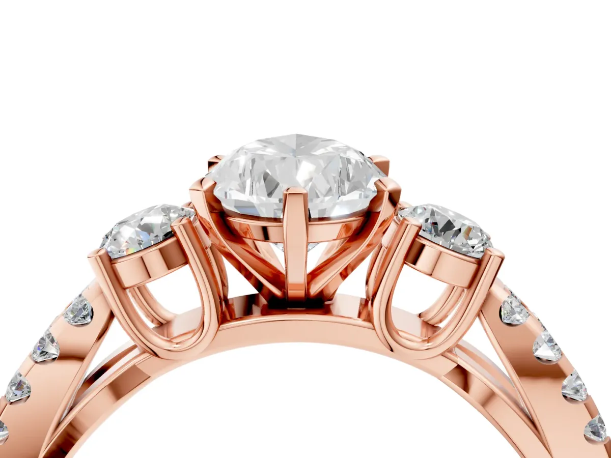 Pear Cut Diamond Three-Stone Ring with Pavé Split Shank and Four-Prong Setting Rose gold