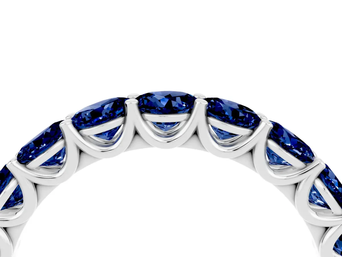 Round Blue Sapphire Shared Prong Eternity Band Silver