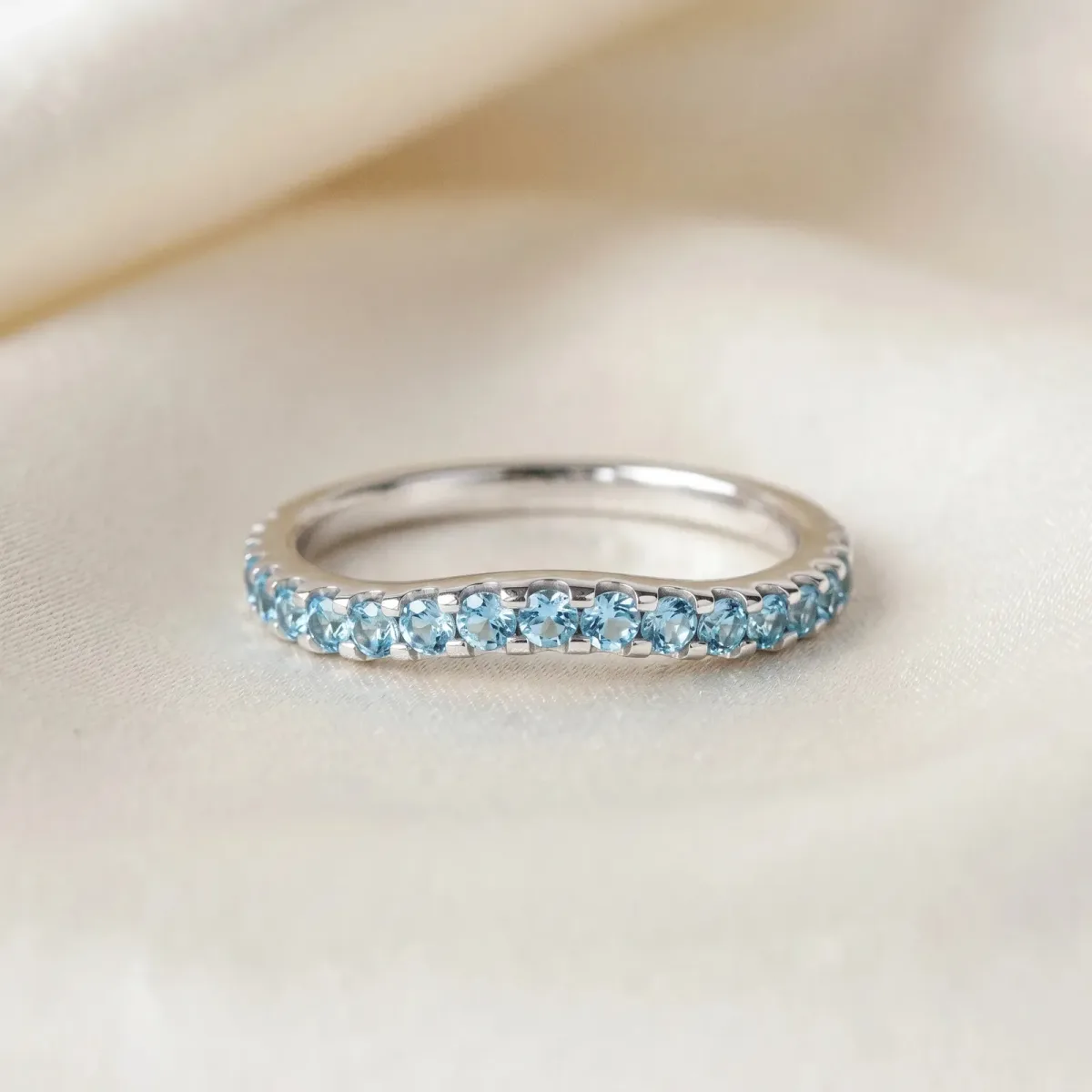 Round Blue Topaz Pavé Curved Wedding Band Platinum