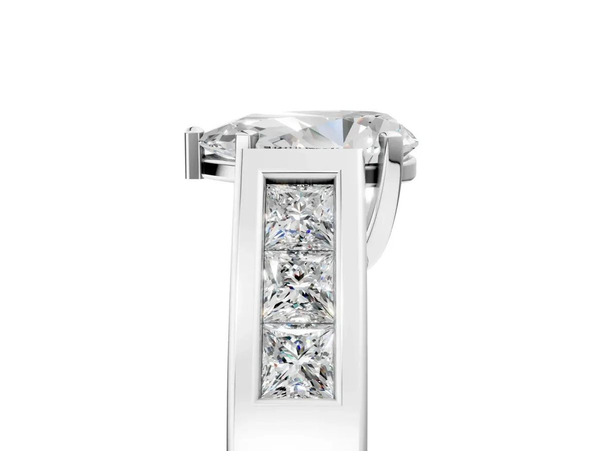 Pear Cut Cut Channel Set Solitaire Ring with Four-Prong Setting Platinum