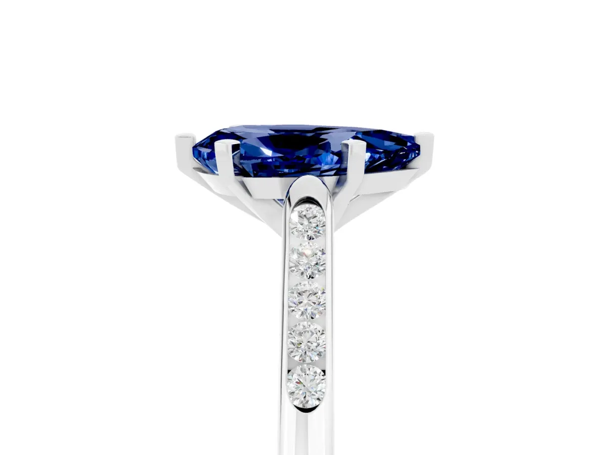 Pear Cut Blue Sapphire Solitaire Ring with Channel Set Round Band and Prong Setting Silver