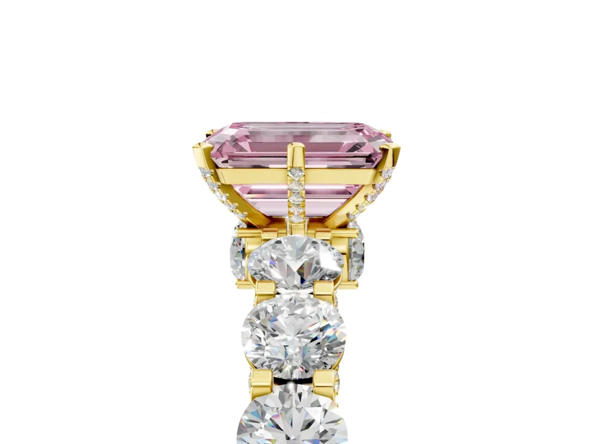 Fancy Pink Emerald Cut Diamond Side Stone Engagement Ring with Four-Prong Setting Yellow gold