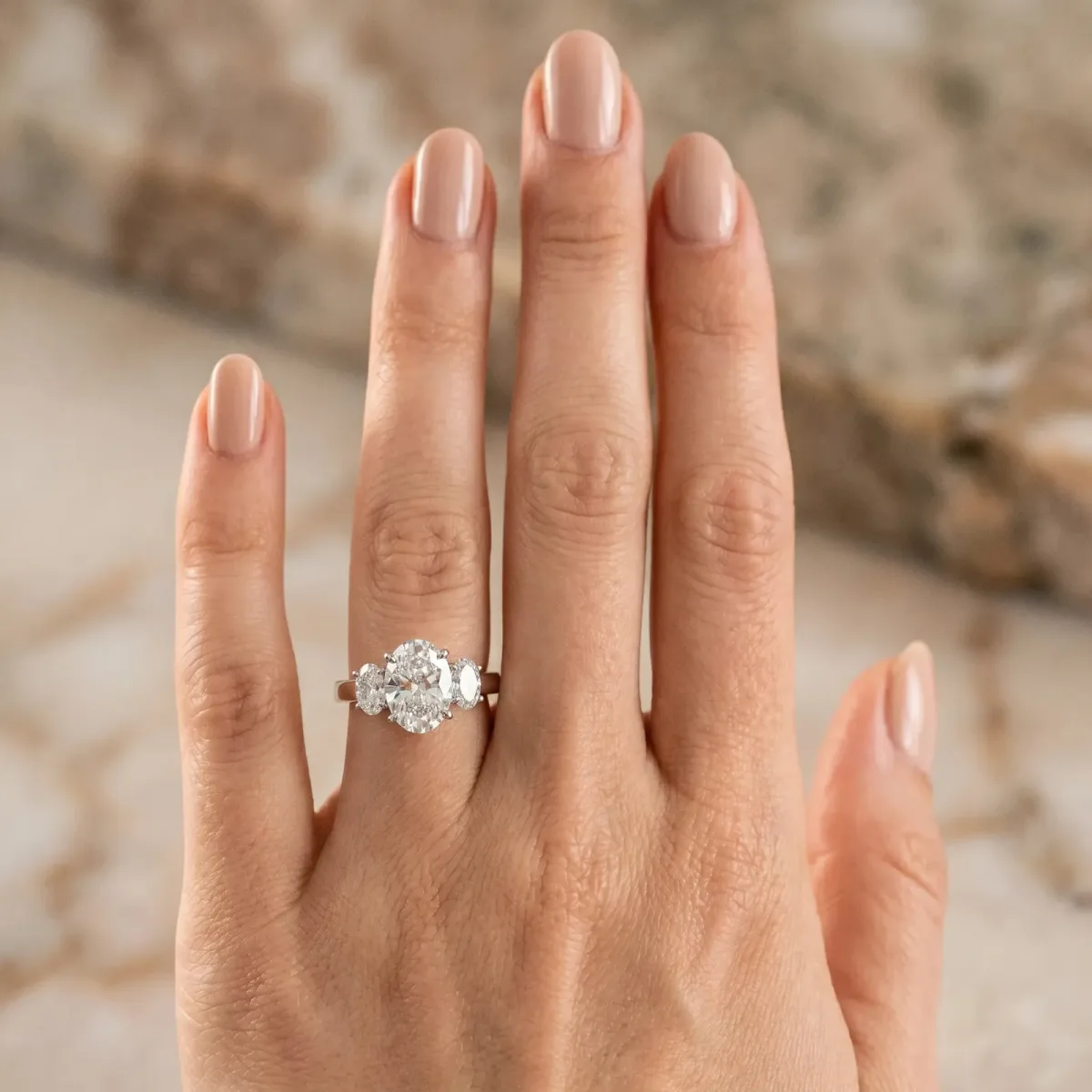 Asscher Cut Three-Stone Diamond Ring with Prong Setting on a Classic Band Platinum