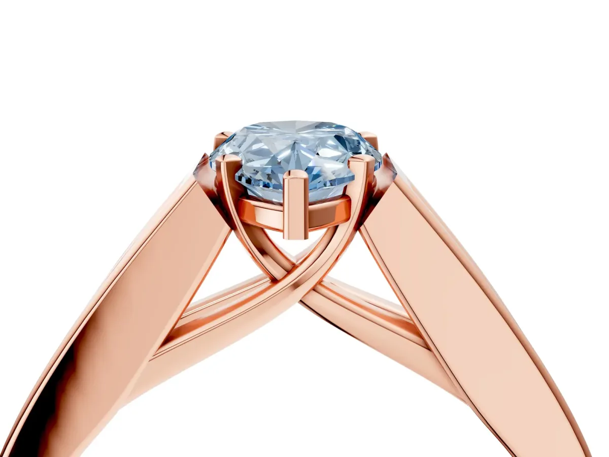 Fancy Blue Pear Cut Cut Channel Set Solitaire Ring with Four-Prong Setting Rose gold