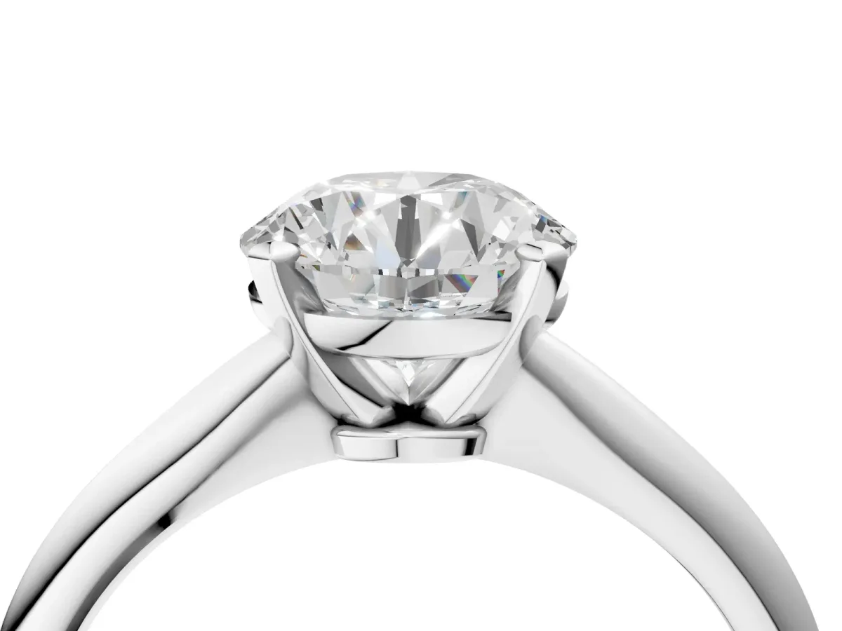 Round Cut Diamond Solitaire Engagement Ring with Classic Band and Four-Prong Setting Silver