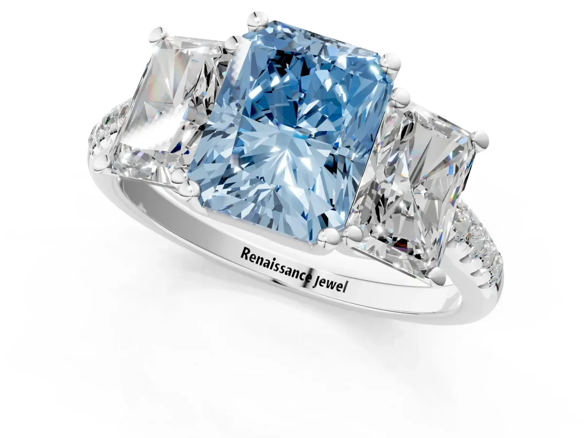 Fancy Blue Three-Stone Radiant Cut Diamond Ring with Round Pavé Band and Prong Setting Silver