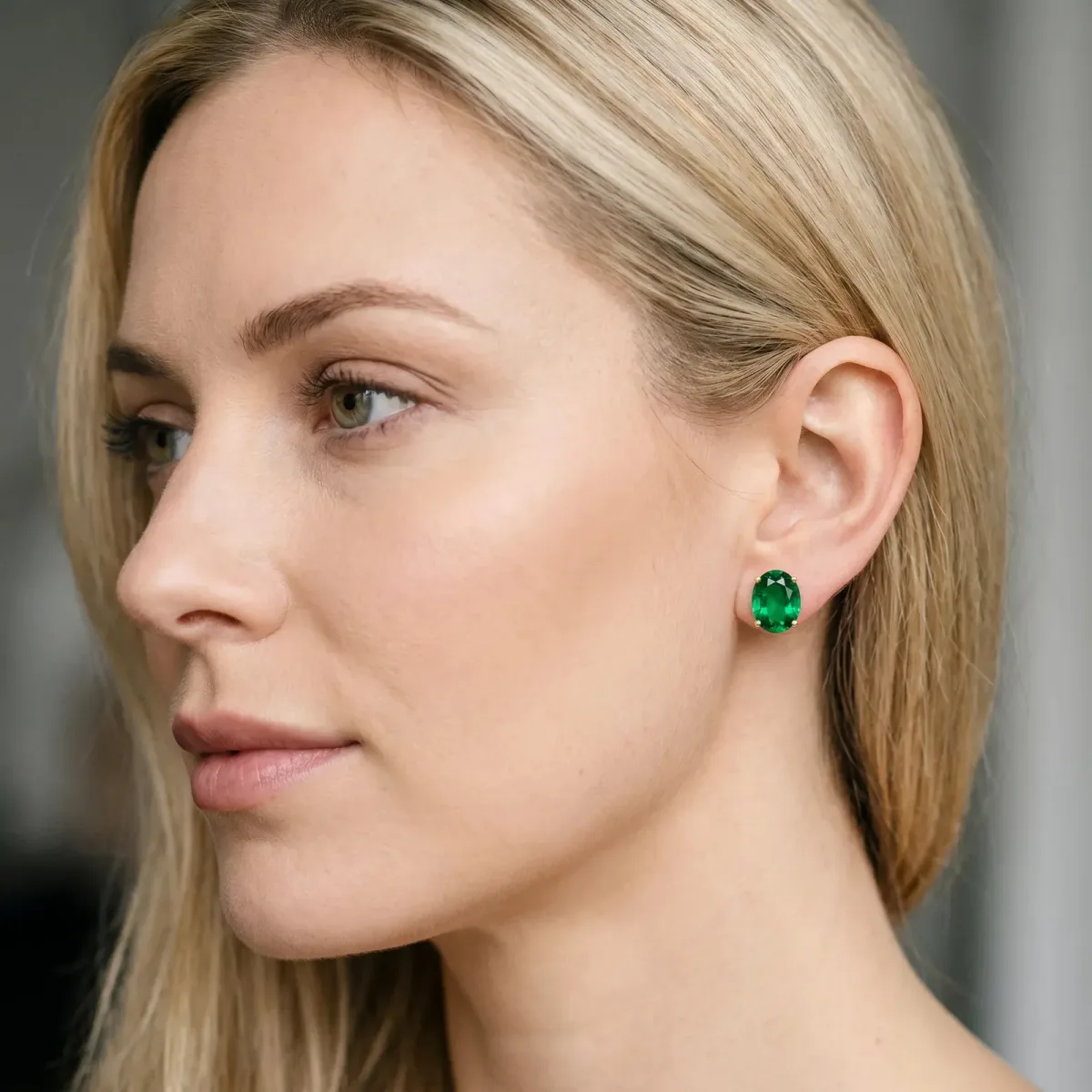 Oval Cut Emerald Stud Earrings Yellow gold